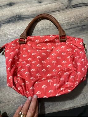 Reddish Coral Umbrella Print handbag with Brown Handles- nylon